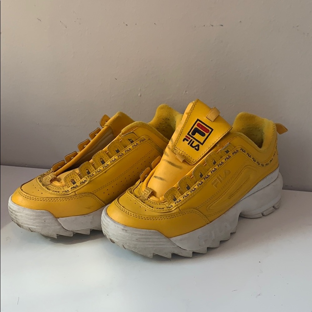Yellow Fila Disruptors